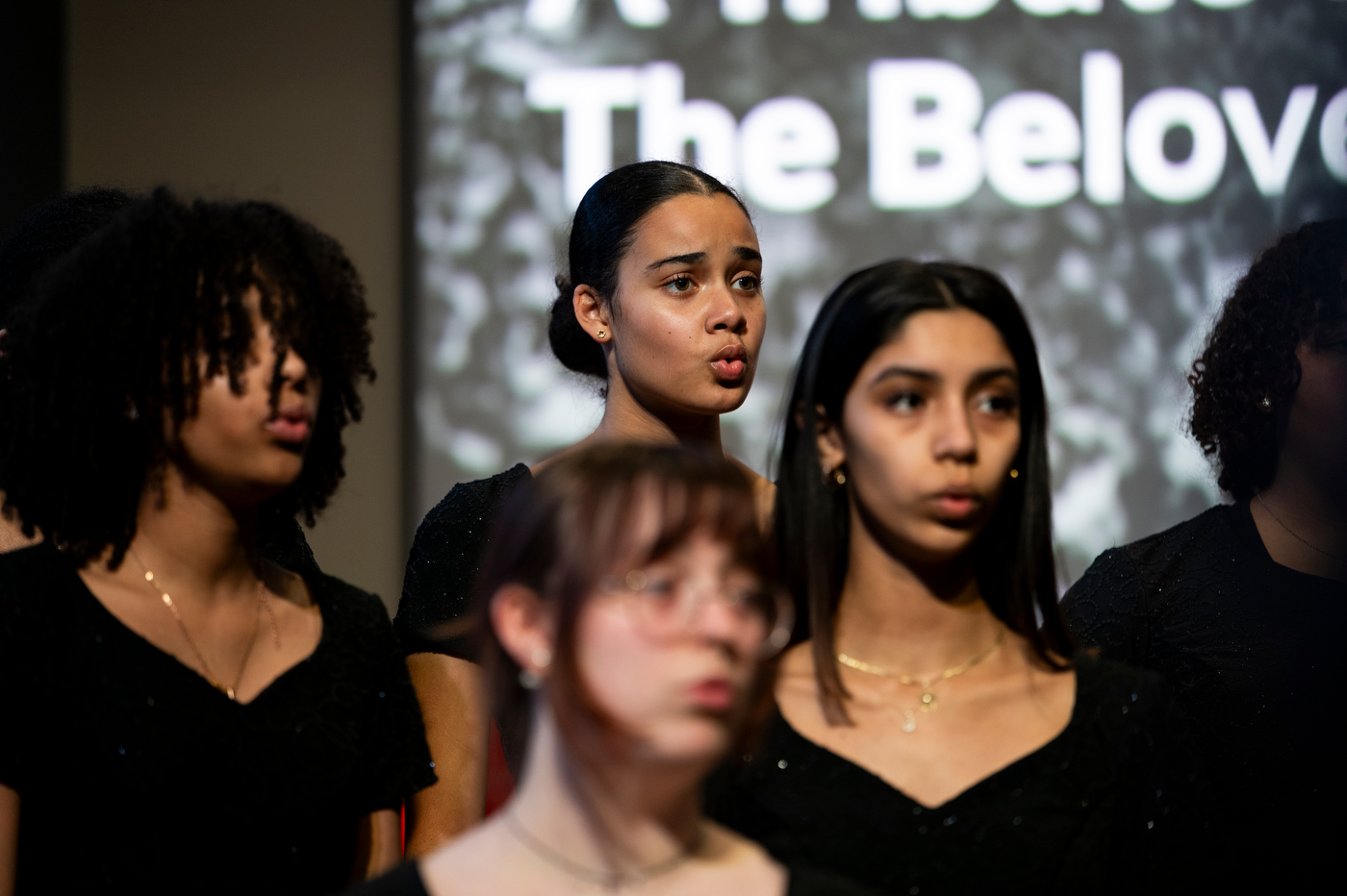 Boston Arts Academy's Spiritual Ensemble singers on stage.