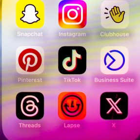 A screenshot of the TikTok app surrounded by other social media apps like Snapchat, Instagram, Pinterest, Threads, Lapse, and X.