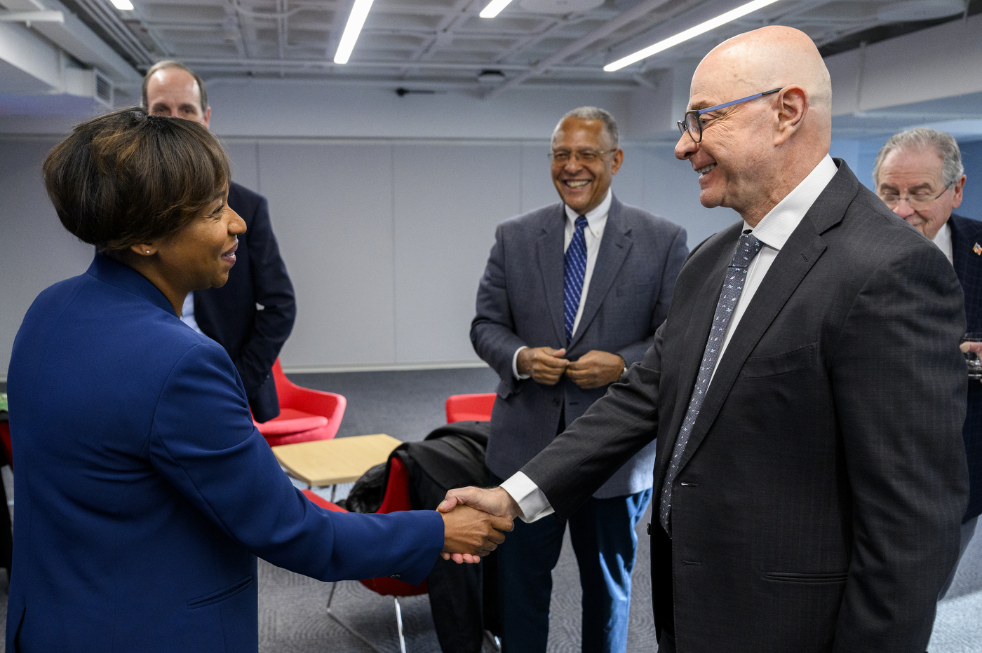 President Aoun shaking hands with Andrea Joy Campbell.