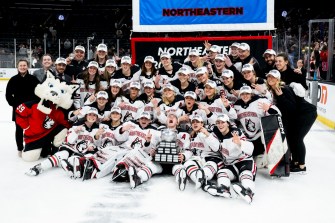 A group photo of the Northeastern Women's Hockey team