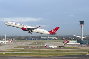 An airplane taking off from the runway at the Heathrow Airport in London.