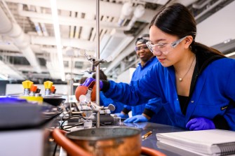 A person working in a lab in EXP.