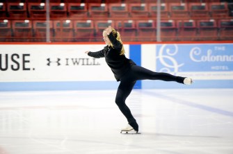 A figure skater on the ice at Matthews Arena.