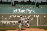 Northeastern pitcher Max Gitlin throws a pitch during the first inning of the Huskies&#039; spring training game against the Red Sox at JetBlue Park.