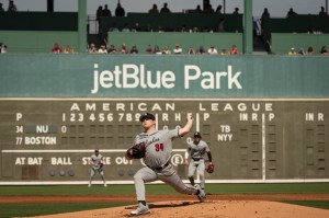 Northeastern pitcher Max Gitlin throws a pitch during the first inning of the Huskies' spring training game against the Red Sox at JetBlue Park.