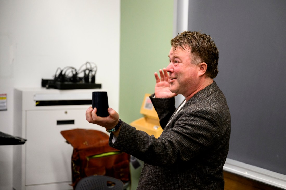 Stephen Wood standing at the front of a classroom.