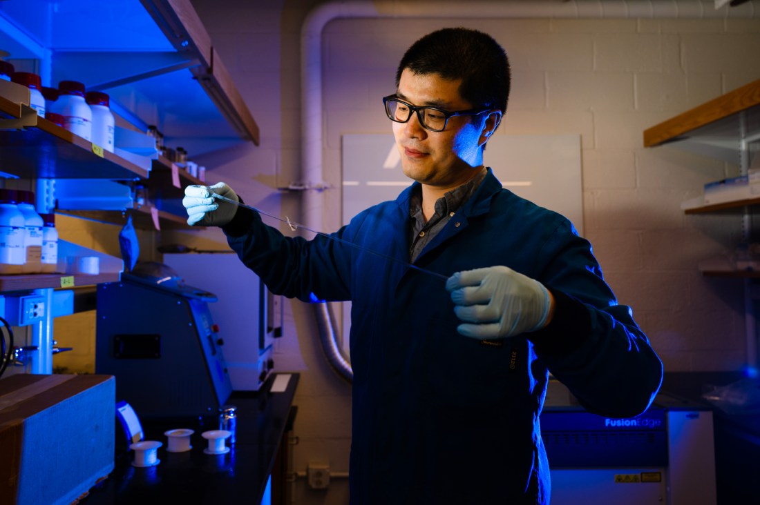Ruobing Bai working in the lab.