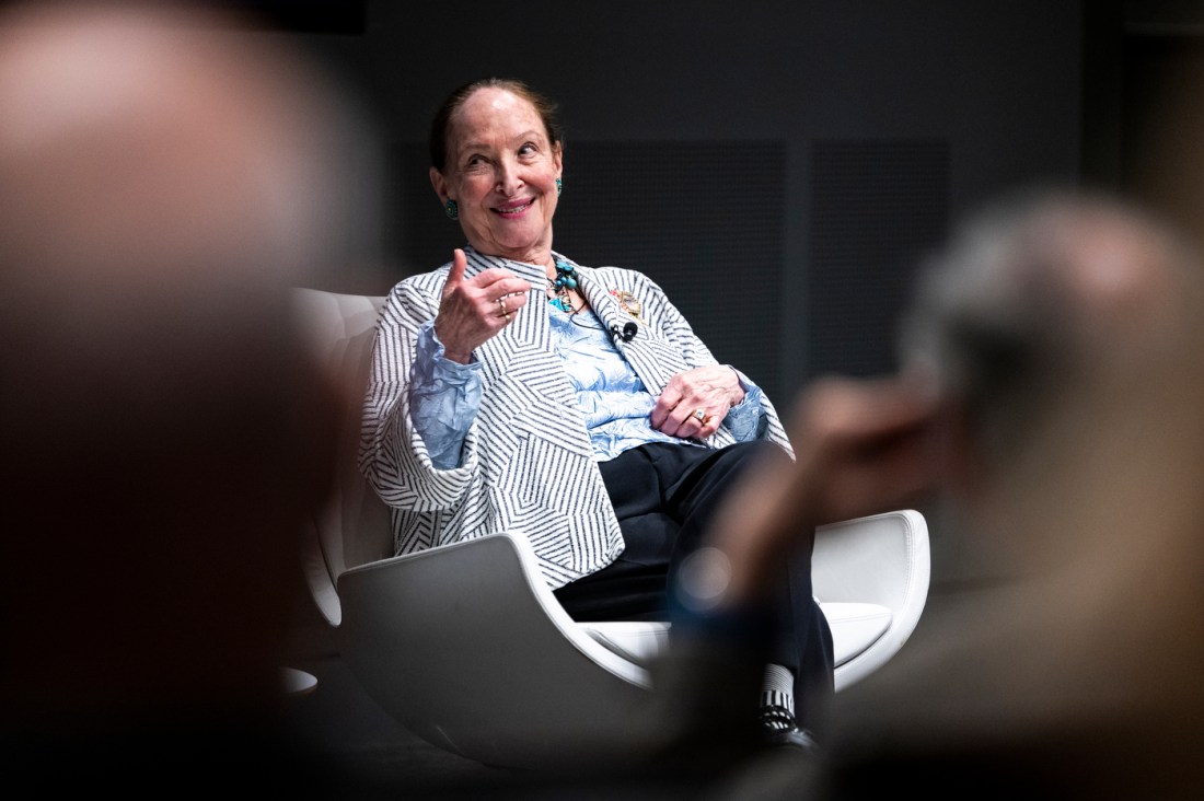 A guest speaker engages with the audience during a panel discussion.