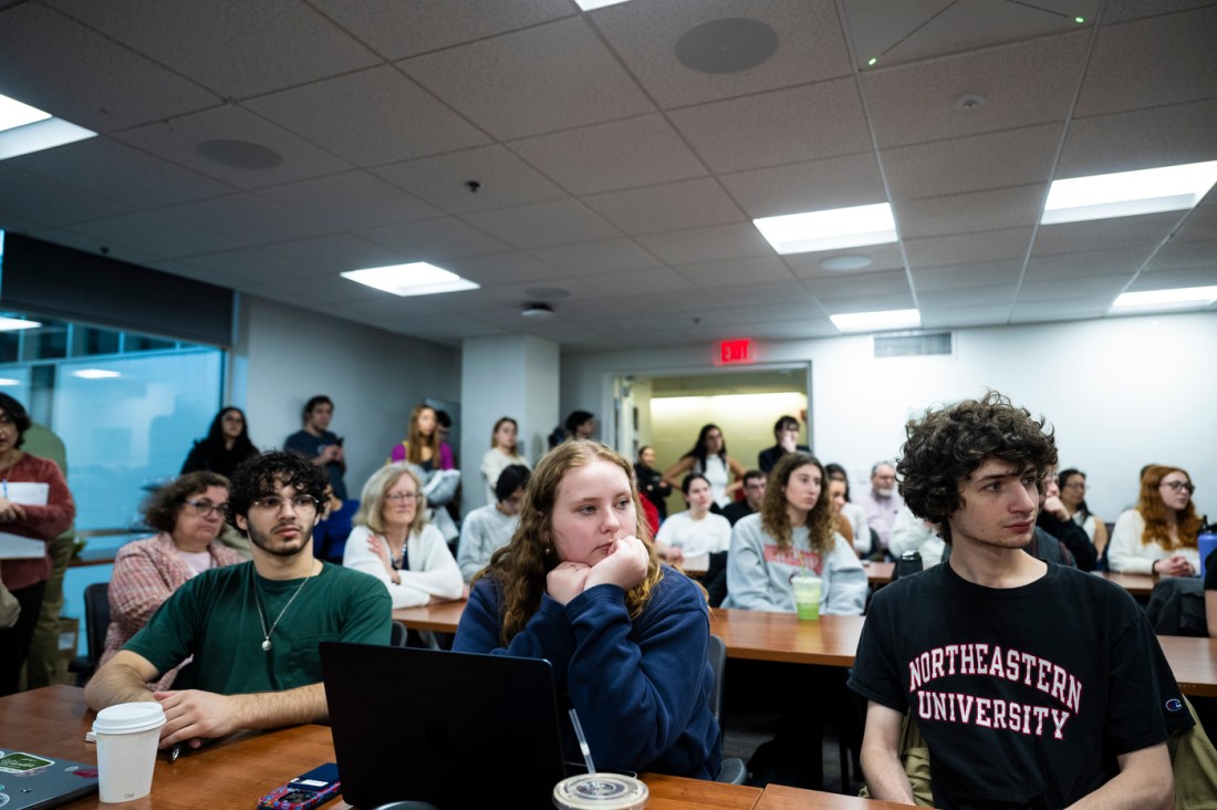 Audience members sitting at a Holocaust Week Survivor Lecture.