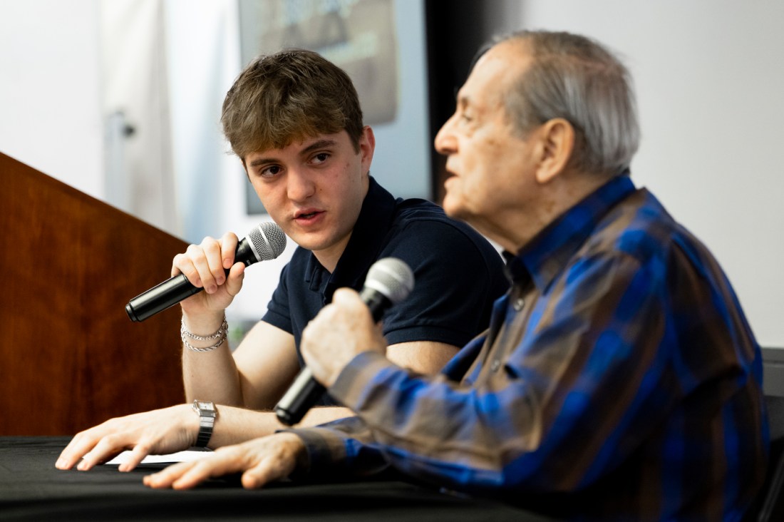 Noah Ben-Zion and Dr. Joseph Berger talking to each other into microphones.