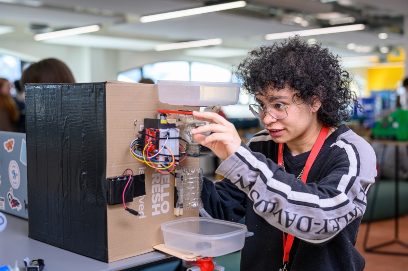 A student working on an engineering project. 