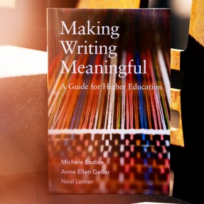 A book propped upright with the title 'Making Writing Meaningful' on it.