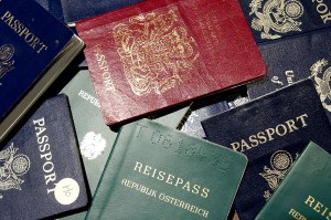 A stack of passports from different countries.