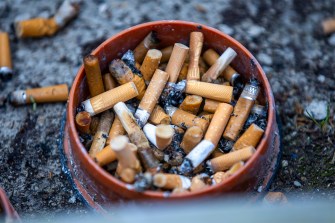 An ashtray full of cigarette butts.