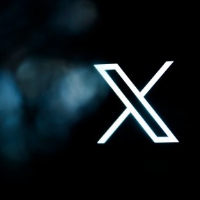 An 'X' shaped logo on a black background.