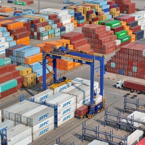 Shipping containers stacked in a terminal in China.