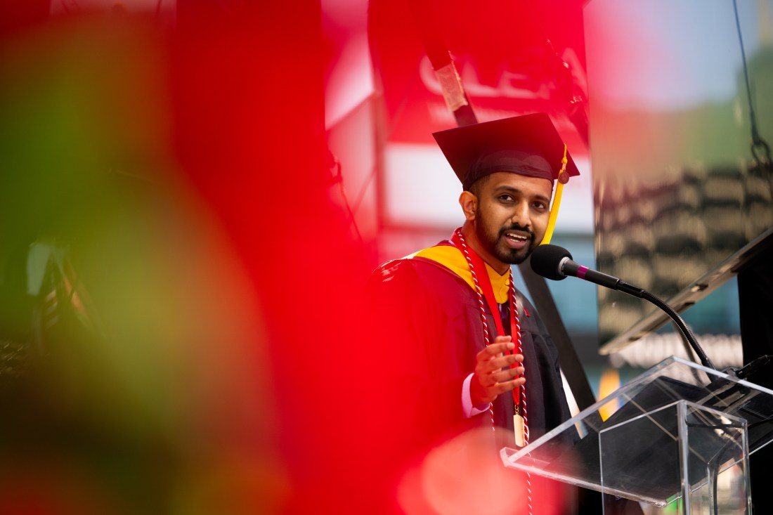 Student speaker delivers remarks during Commencement at Fenway Park.