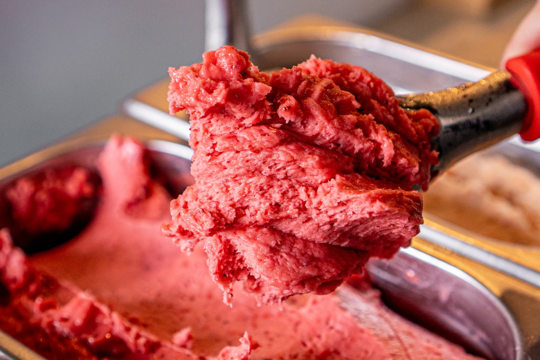A scope of red-colored gelato.