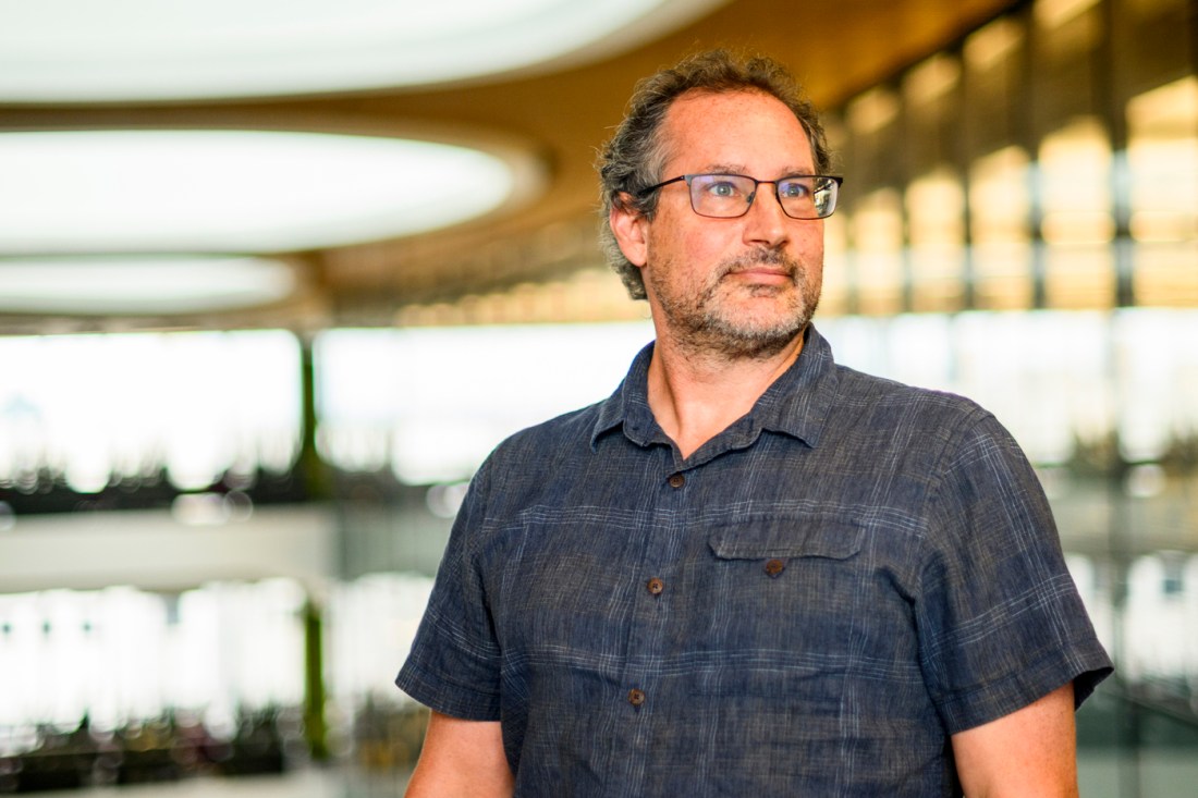 Portrait of Aaron Seitz inside ISEC.