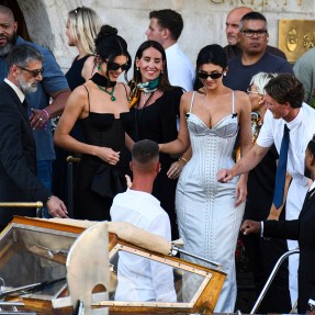 Kylie and Kendall Jenner in formal gowns leaving the wedding of Jeff Bezos and Lauren Sanchez.