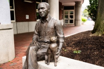 A photograph of the The Robert J. Shillman and Yitz the cat statue.