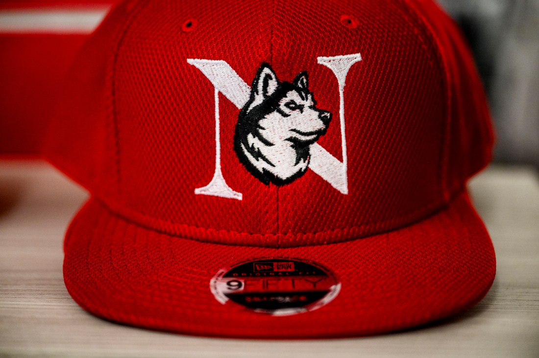 Red hat with Northeastern Husky logo