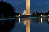 A photo of a lightning strike over the National Mall in Washington D.C. at dark.