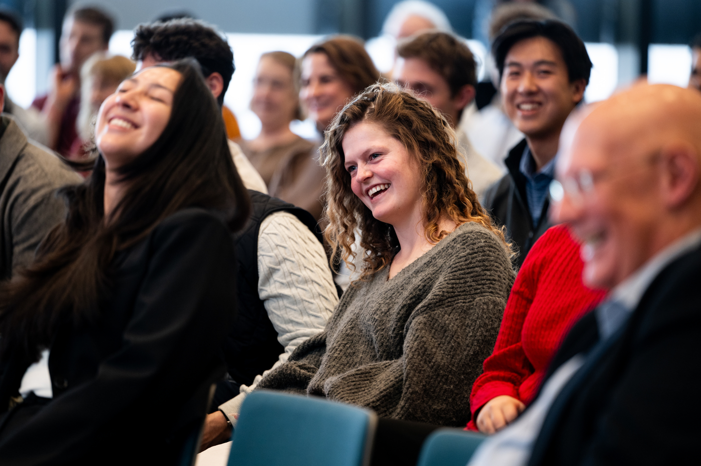 Audience members laugh and engage during Northeastern University’s President’s Leadership Series event featuring Jeff Weiner and Joseph E. Aoun.